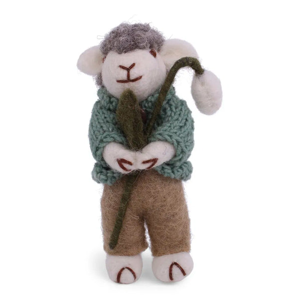 Grey sheep | green jacket and snow drop