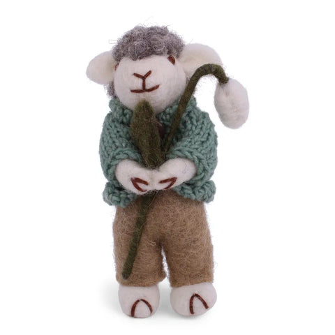 Grey sheep | green jacket and snow drop