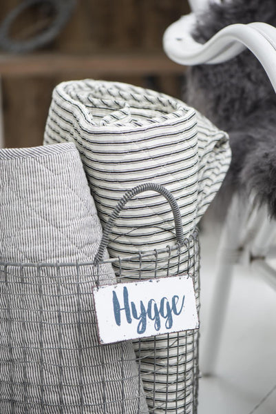 Cotton Quilt - White & Dark Grey Stripes rolled up in basket